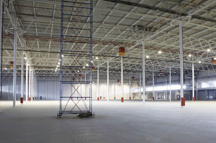 Large empty interior warehouse structure waiting to be filled